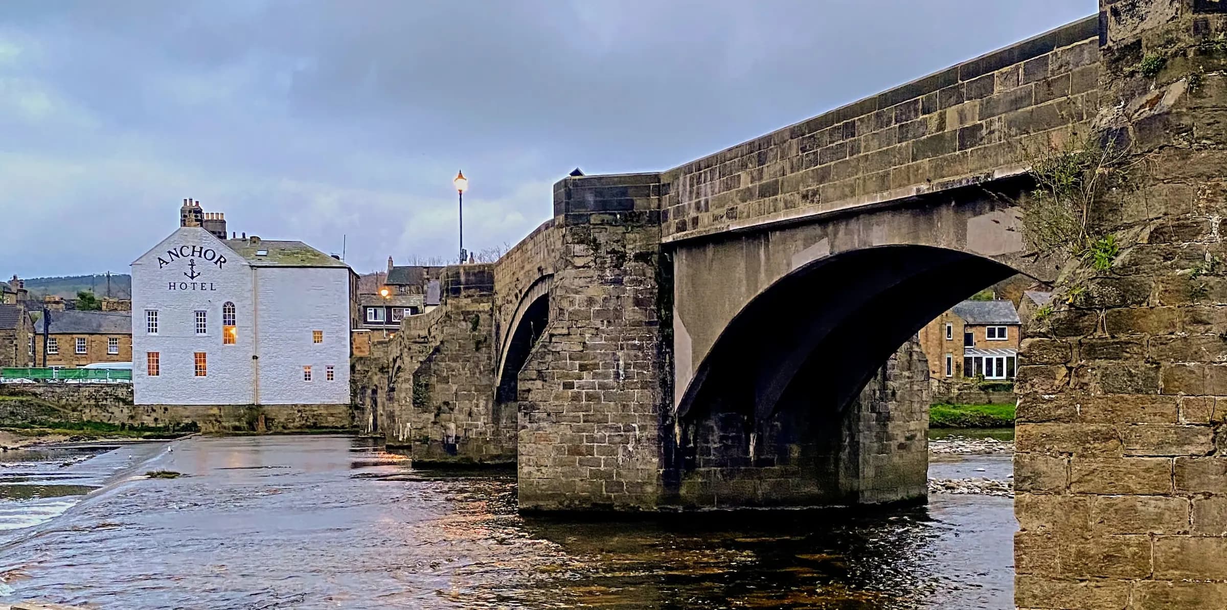 Riverside view of The Anchor Hotel in Haydon Bridge